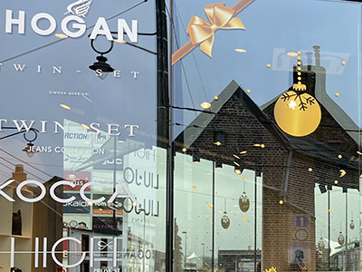 VDFA lettrage publicitaire de vitrine magasin commerce pose en wallonie belgique