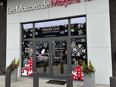 VDFA lettrage publicitaire de vitrine magasin commerce pose hainaut charleroi et mons